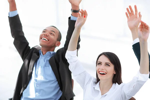 Happy business colleagues on the background of the office. — Stock Photo, Image