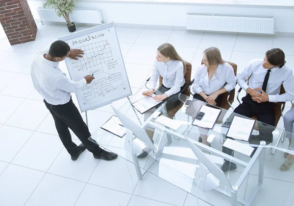 Top view.business team at presentation of a new financial project. — Stock Photo, Image