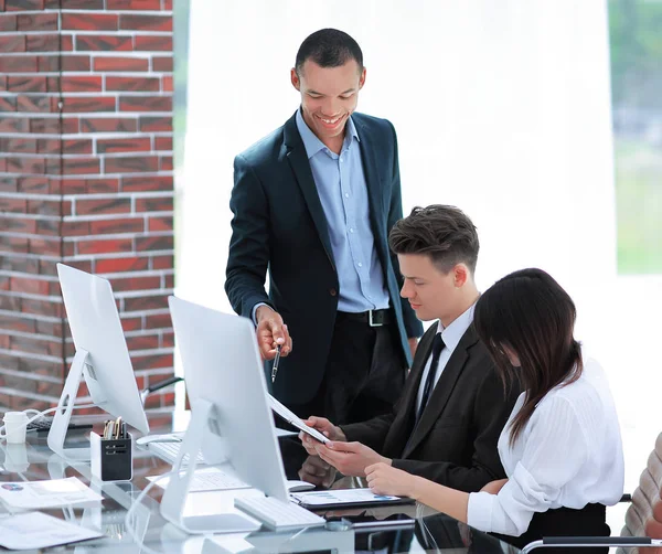 Business team working with documents in a modern office. — Stock Photo, Image