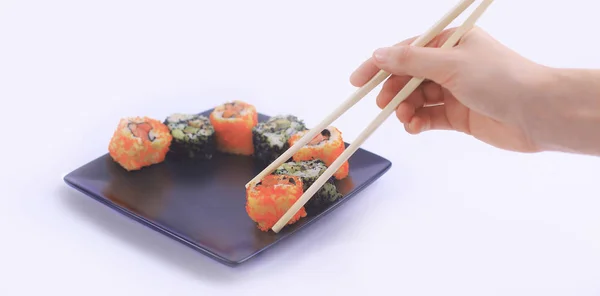 Closeup.sticks et un ensemble de rouleaux Sushi — Photo