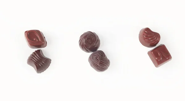 Nahaufnahme. Schokoladenbonbons. isoliert auf weiß.photo mit copy sp — Stockfoto