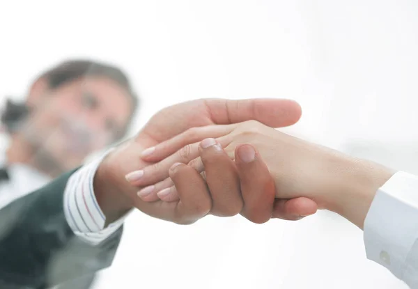 Zpoza skla. Handshake obchodních partnerů — Stock fotografie