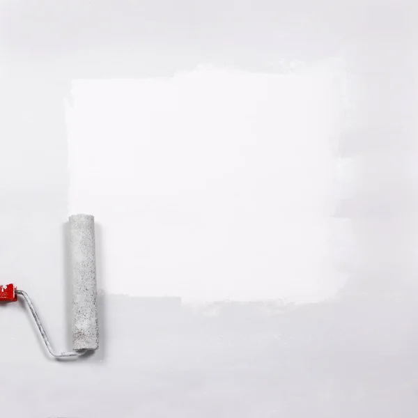 Beyaz bir sayfada boya silindiri ile beyaz boyalı Meydanı — Stok fotoğraf