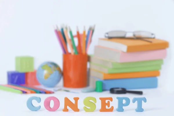 Word concept on blurred background of school supplies .photo with copy space — Stock Photo, Image