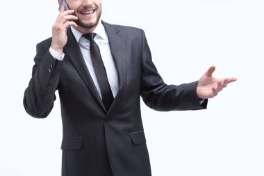 cep telefonu üzerinde konuşurken yakın up.smiling iş adamı
