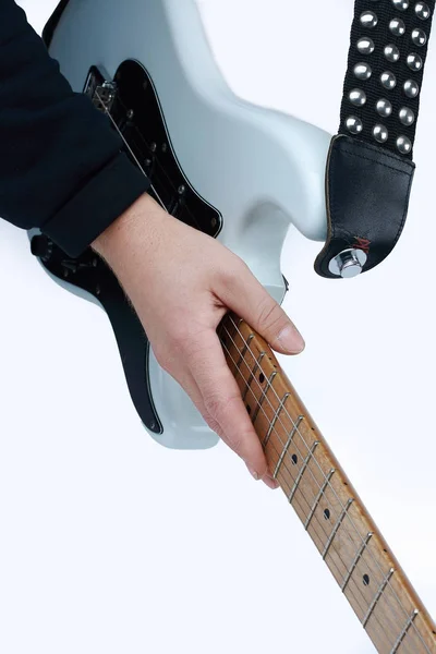 Close-up. modern electric guitar in the hands of the guitarist . — Stock Photo, Image