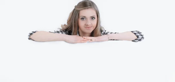 Young business woman relies on a large blank poster — Stock Photo, Image