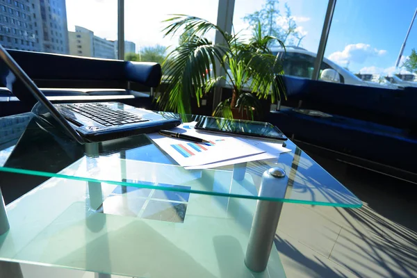 Close up.laptop and financial scheme on the Desk in the office — Stock Photo, Image