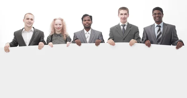 Successful business team showing empty blank banner — Stock Photo, Image