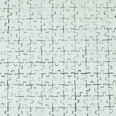 yakın çekim. puzzle parçaları üzerinde gri backgr toplanan boş kartı