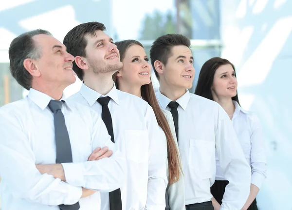 Successful business team looking at copy space. — Stock Photo, Image