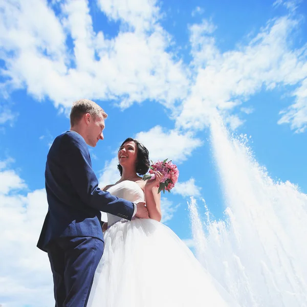 Loving couple on wedding day on a Sunny day — Stock Photo, Image