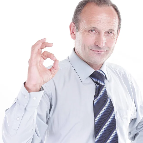 Confident businessman shows gesture OK.isolated on white — Stock Photo, Image