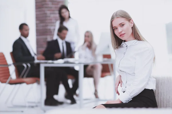 Young business woman on the background of the office — Stock Photo, Image