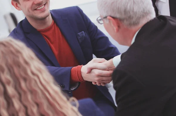 close up.handshake between Manager and client as a sign of cooperation