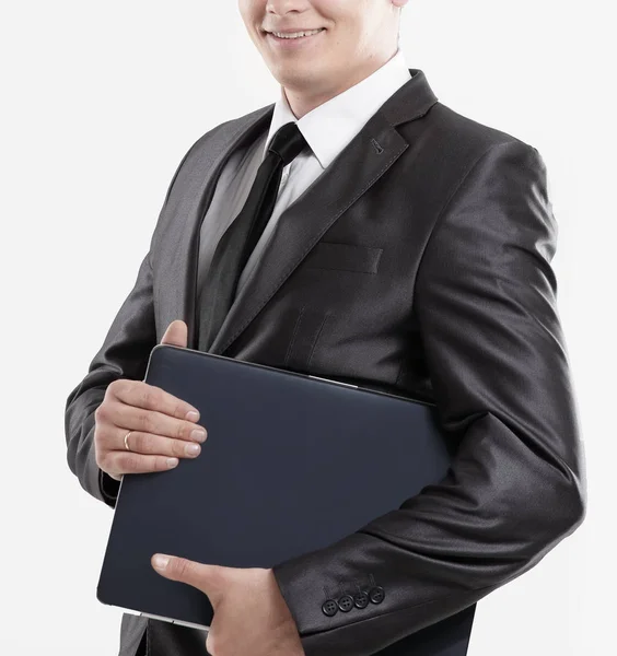 Jeune homme d'affaires avec ordinateur portable fermé. isolé sur blanc — Photo