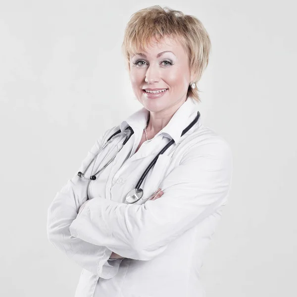 Retrato de mulher praticando physician.isolated no branco — Fotografia de Stock