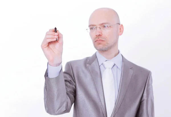 Handsome businessman pointing the marker at the virtual point — Stock Photo, Image