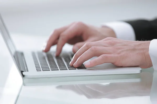 Close up hands multitasking man using laptop connecting wifi — Stock Photo, Image