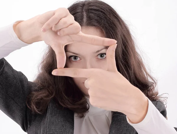 Verbaasd zakenvrouw maken een fotolijst uit haar handen. — Stockfoto