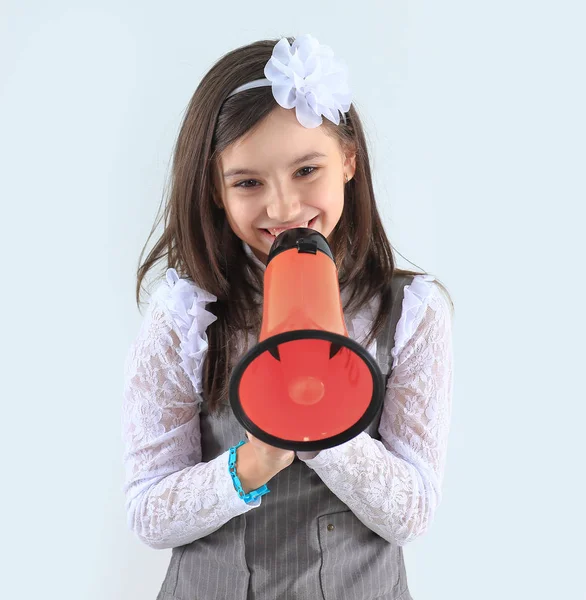 Little girl with a red megaphone .isolated on white background — Stock Photo, Image