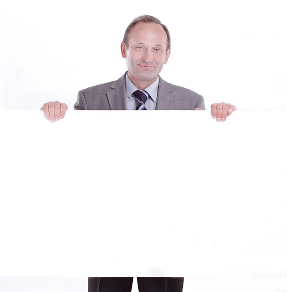 Бизнесмен с чистым белым плакатом. фото с копировальным местом — стоковое фото