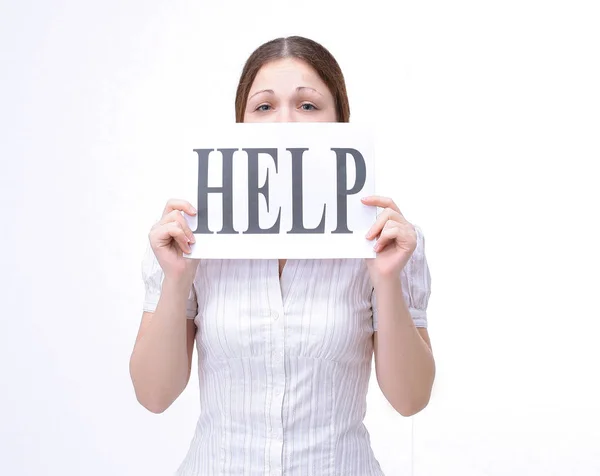 Modern young woman showing a sheet that says HELP — Stock Photo, Image