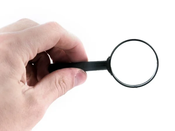 Close up. magnifying glass in hand businessman.photo with copy s — Stock Photo, Image