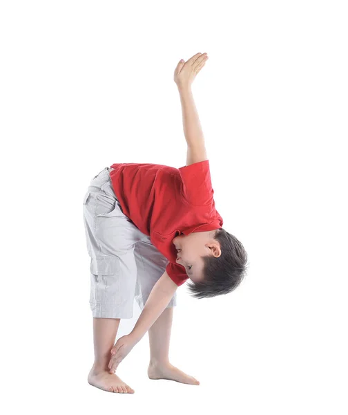 Niño realiza un ejercicio para estirar los músculos.aislado en blanco — Foto de Stock