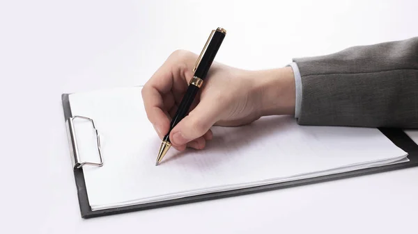 Closeup.businessman signing a contract.photo with copy space. — Stock Photo, Image