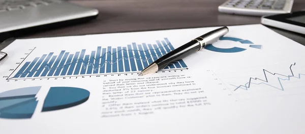 Business background. financial report on the table at the businessman — Stock Photo, Image