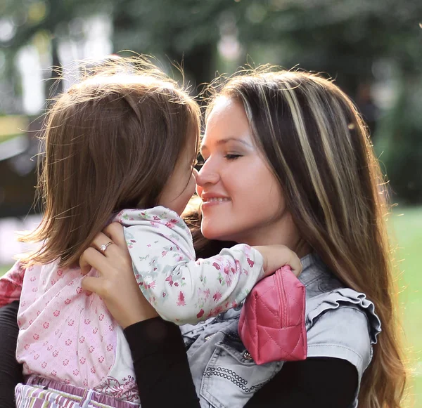 Loving mom with little daughter on a walk — Stock Photo, Image