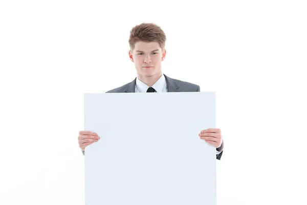 Joven empresario exitoso con banner en blanco.aislado en un blanco — Foto de Stock