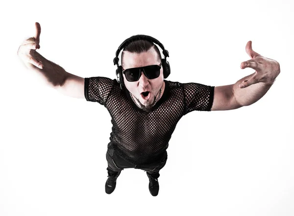 Vista do topo - DJ - rapper com fones de ouvido em um backg luz — Fotografia de Stock
