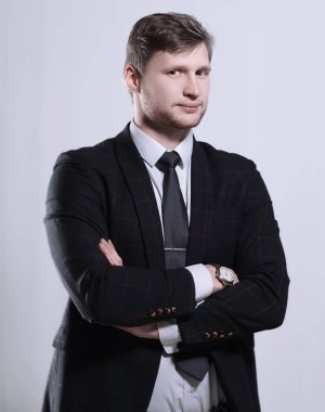 ciddi iş adamı ile onun silah folded.isolated standları