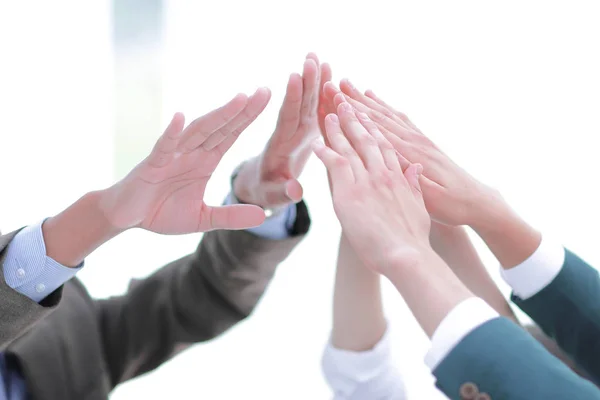 Closeup.business team giving each other a high five. — Stock Photo, Image
