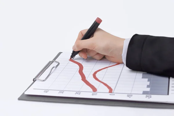 Closeup .Businessman dibujar una acción chart.isolated en blanco —  Fotos de Stock