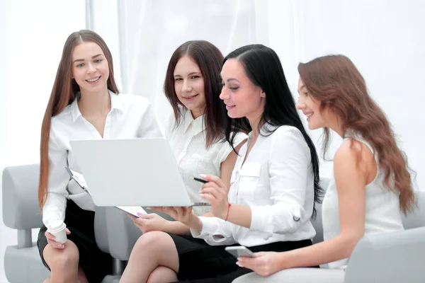 Group of employees using laptop to check financial data — Stock Photo, Image