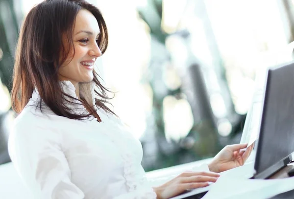 Closeup. modern business woman working with documents sitting at her Desk — Stock Photo, Image