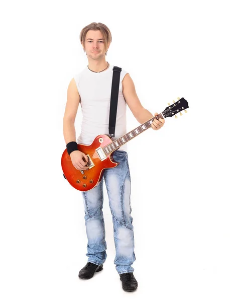 Retrato em pleno crescimento.um jovem cara com uma guitarra — Fotografia de Stock