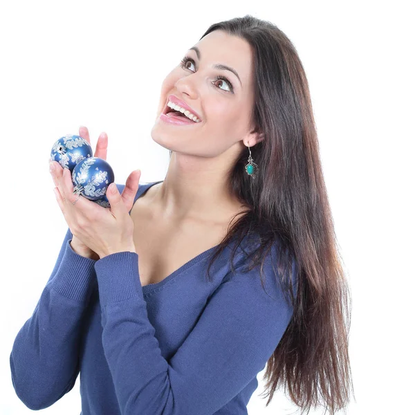 Beautiful young woman holding a blue Christmas ball. — Stock Photo, Image