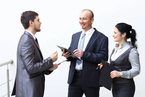 Group of business people discussing financial documents. — Stock Photo, Image