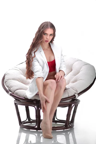 Close up. portrait of sexy young woman in lingerie sitting in papasan chair — Stock Photo, Image