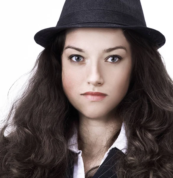 Stylish young woman in suit and hat. — Stock Photo, Image
