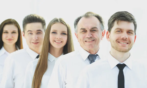 Close up. boss and confident business team standing in a row — стоковое фото