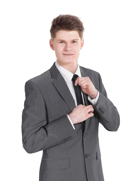 年轻的商人正在调整他的领带。 — 图库照片