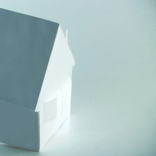 Paper house on grey background with copy space for text — Stock Photo, Image