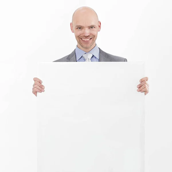 Guapo hombre de negocios mostrando pancarta en blanco.aislado en blanco — Foto de Stock