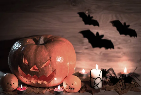 Halloween pumpkin head jack lantern in the wooden background — Stock Photo, Image