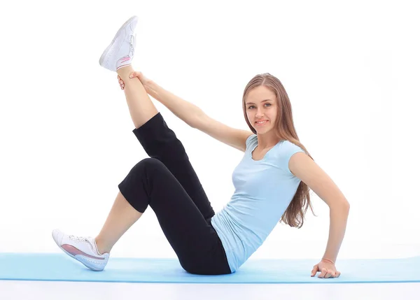 Mujer joven deportiva haciendo ejercicio de estiramiento de los músculos  . —  Fotos de Stock